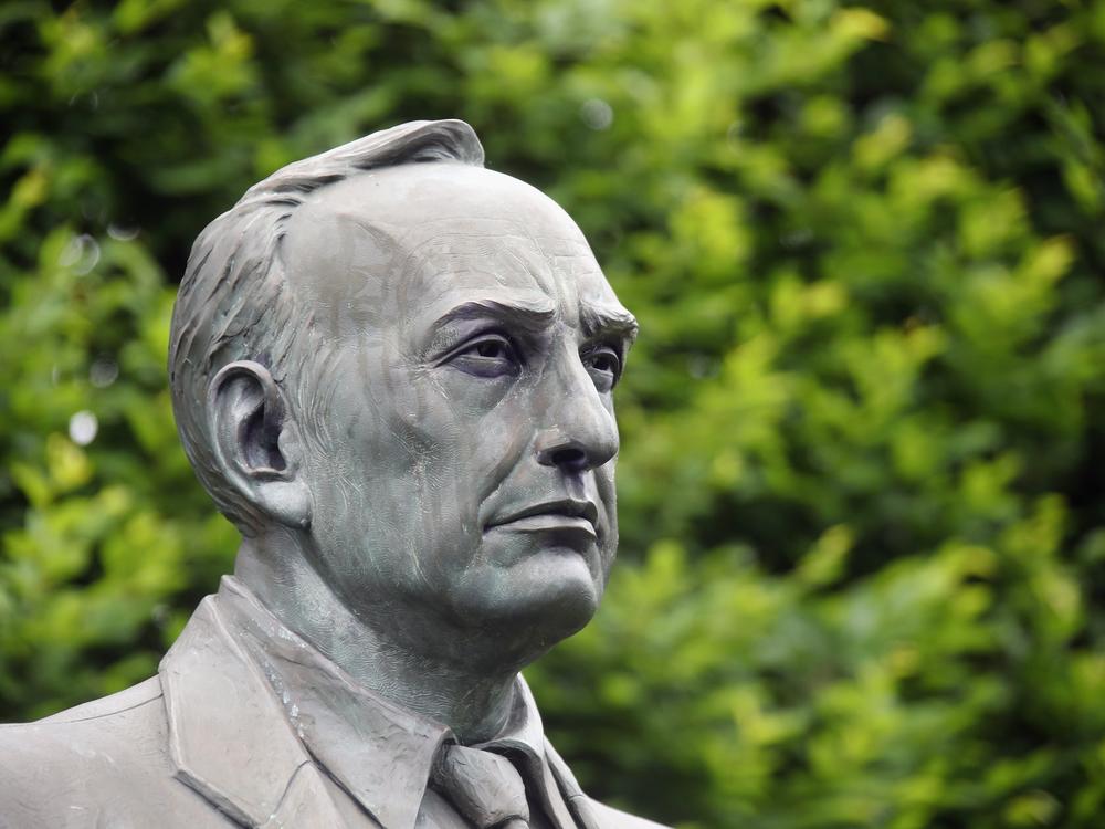 A statue of Robert Moses in Babylon, New York in 2020.