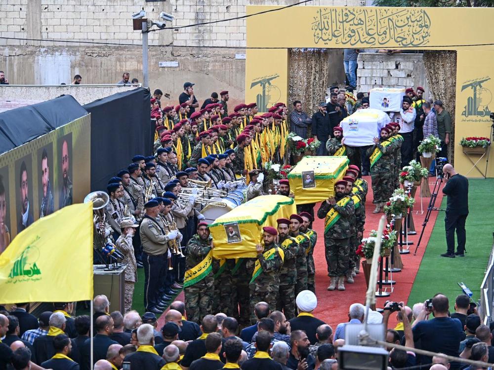 A funeral ceremony is held on Sept. 18 in the Dahiyeh neighborhood, south of the capital Beirut, for four people who were killed in Lebanon when pagers used by Hezbollah members detonated.