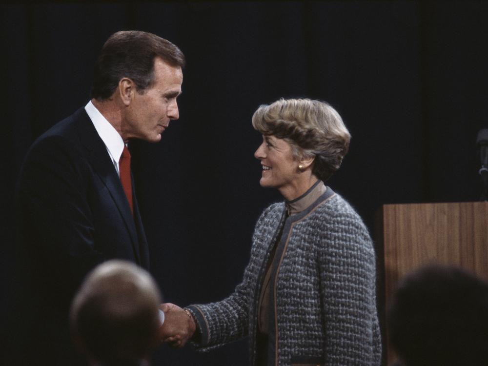 Vice President George Bush and New York congresswoman Geraldine Ferraro shake hands during a televised debate from Philadelphia.