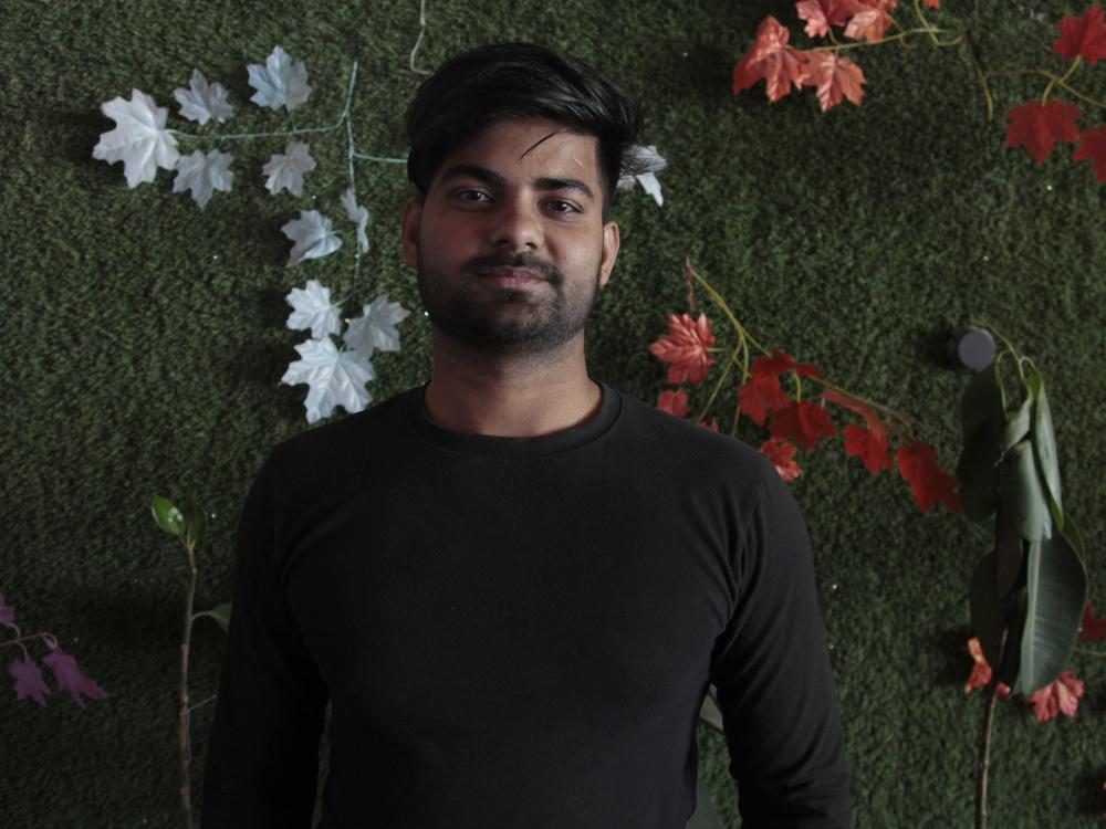 Amazon employee Rajesh Singh in a roadside café in Manesar, India.