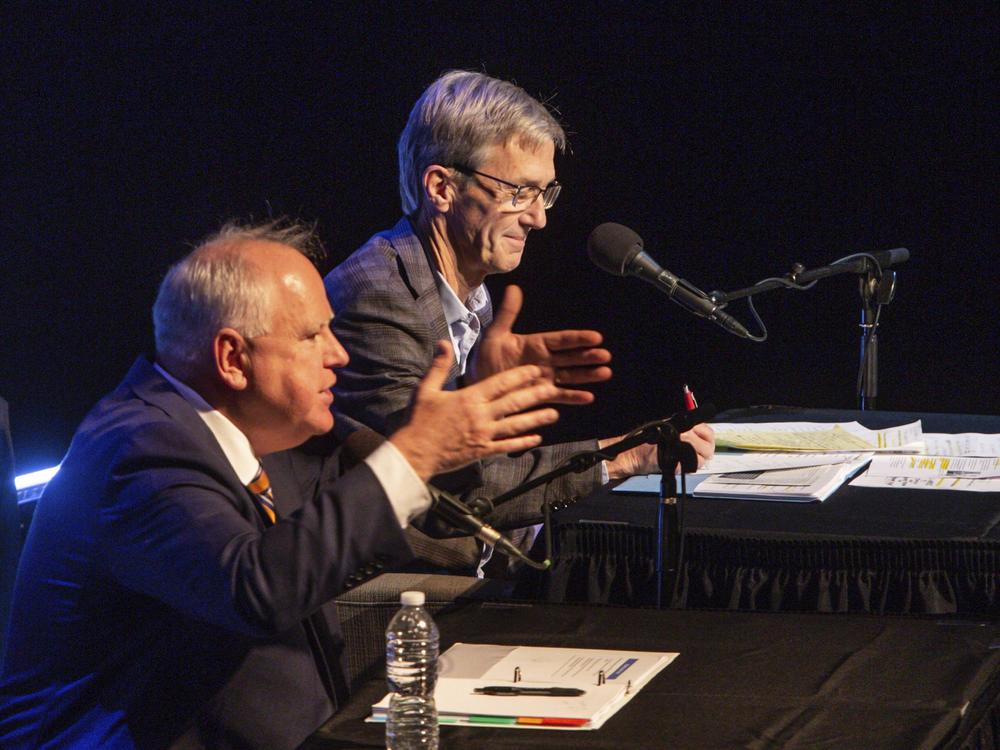 Minnesota Gov. Tim Walz (left) and gubernatorial candidate Scott Jensen engage in a gubernatorial debate at the Fitzgerald Theater on Oct. 28, 2022, in St. Paul.<br>