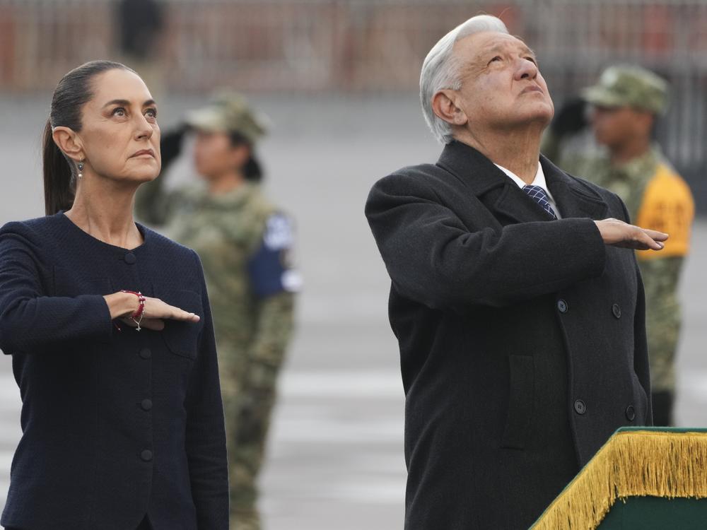 Mexico's President-elect Claudia Sheinbaum and outgoing President Andres Manuel Lopez Obrador attend an anniversary event honoring the victims of the 1985 and 2017 earthquakes, at the Zocalo in Mexico City,