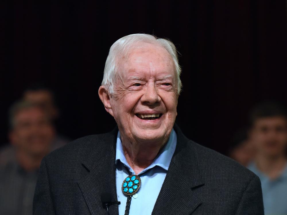 Former President Jimmy Carter speaks to the congregation at Maranatha Baptist Church before teaching Sunday school in his hometown of Plains, Ga., in April 2019. He taught Sunday school at the church on a regular basis after leaving the White House in 1981, drawing hundreds of visitors who would arrive hours early to get a seat.
