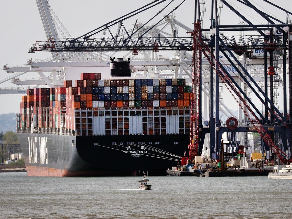 A cargo ship sits in a New Jersey port along New York Harbor on April 19, 2023.