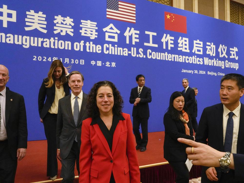 Jen Daskal (center), a deputy assistant to President Biden on the National Security Council who focuses on fentanyl policy, walks next to Xu Datong (right), director of China's Narcotic Control Bureau, after a launch ceremony of the U.S.-China Counternarcotics Working Group in Beijing on Jan. 30.