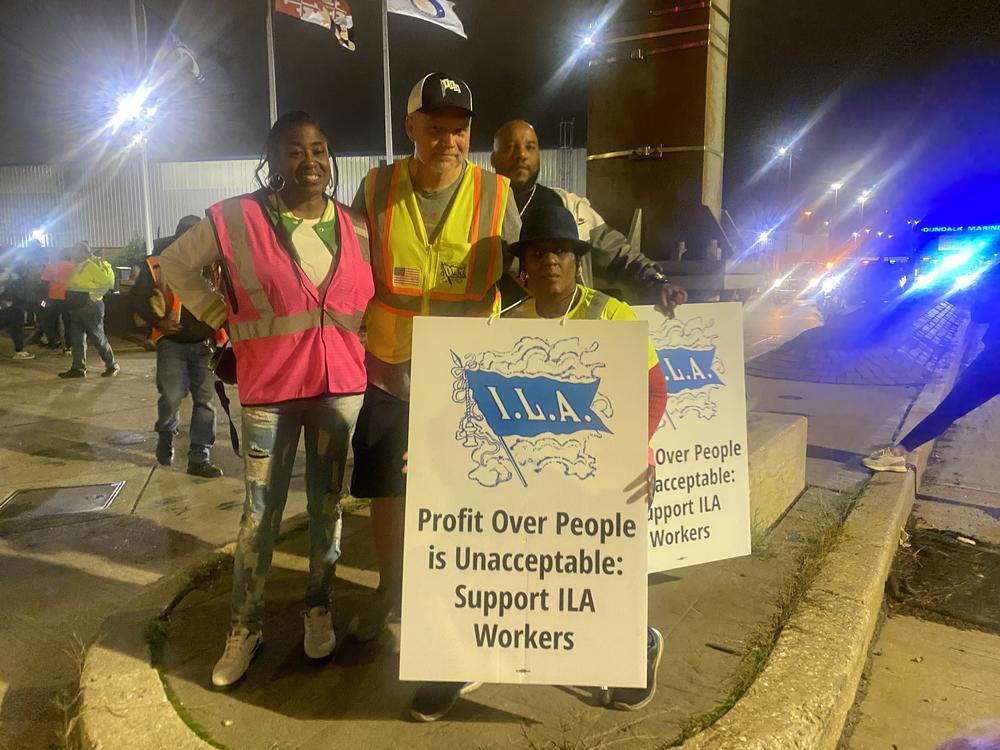 Scott Cowan, president of the International Longshoremen's Association Local 333, joins dockworkers on the picket line at the Dundalk Marine Terminal at the Port of Baltimore shortly after midnight on Tuesday, October 1, 2024.
