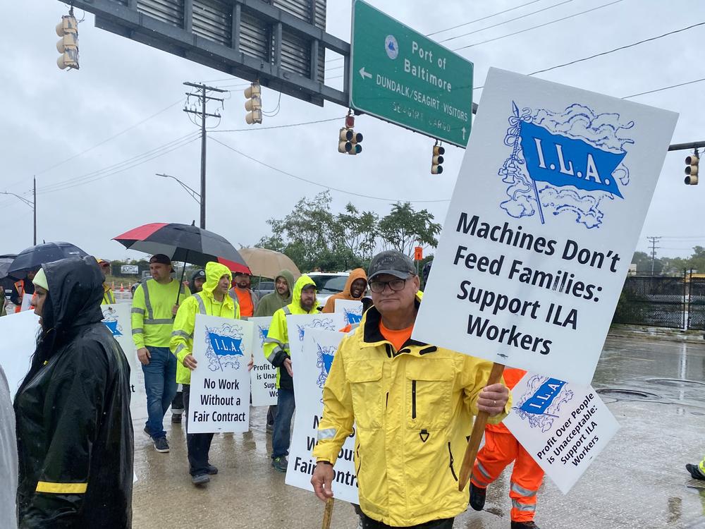 Workers walk the picket line outside Dundalk Marine Terminal at the Port of Baltimore on October 1, 2024.