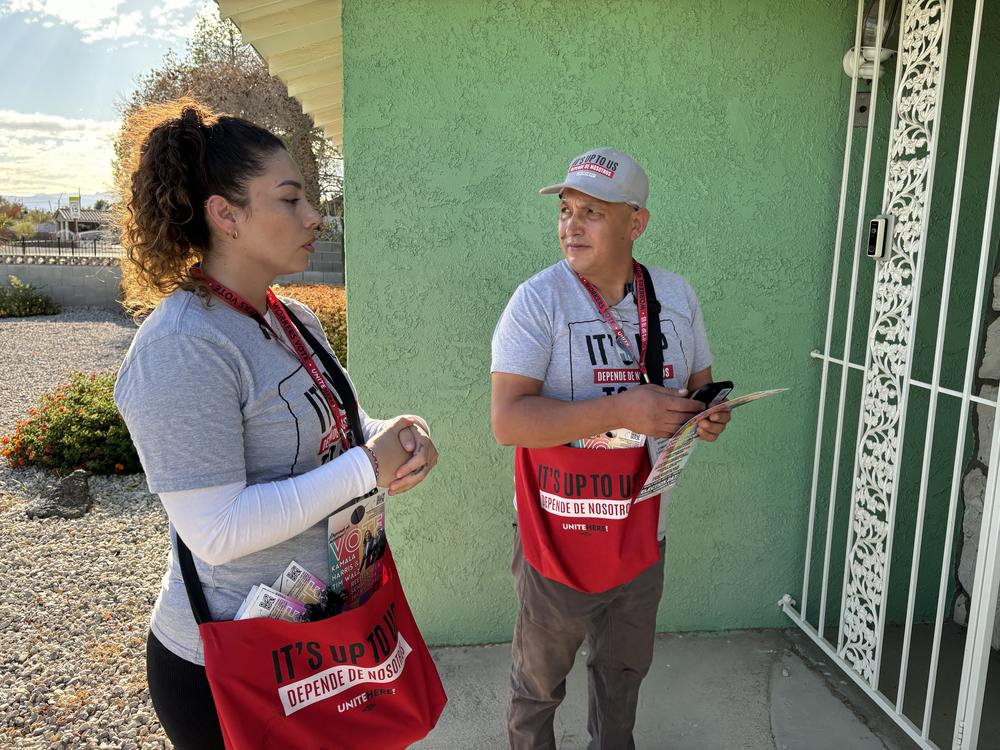 Nancy Chavez Florez and Mauricio Baena, a kitchen worker and food runner, are members of the Culinary Workers Union. They have been knocking on doors in Latino and minority neighborhoods in Las Vegas in support of Vice President Kamala Harris. <br>