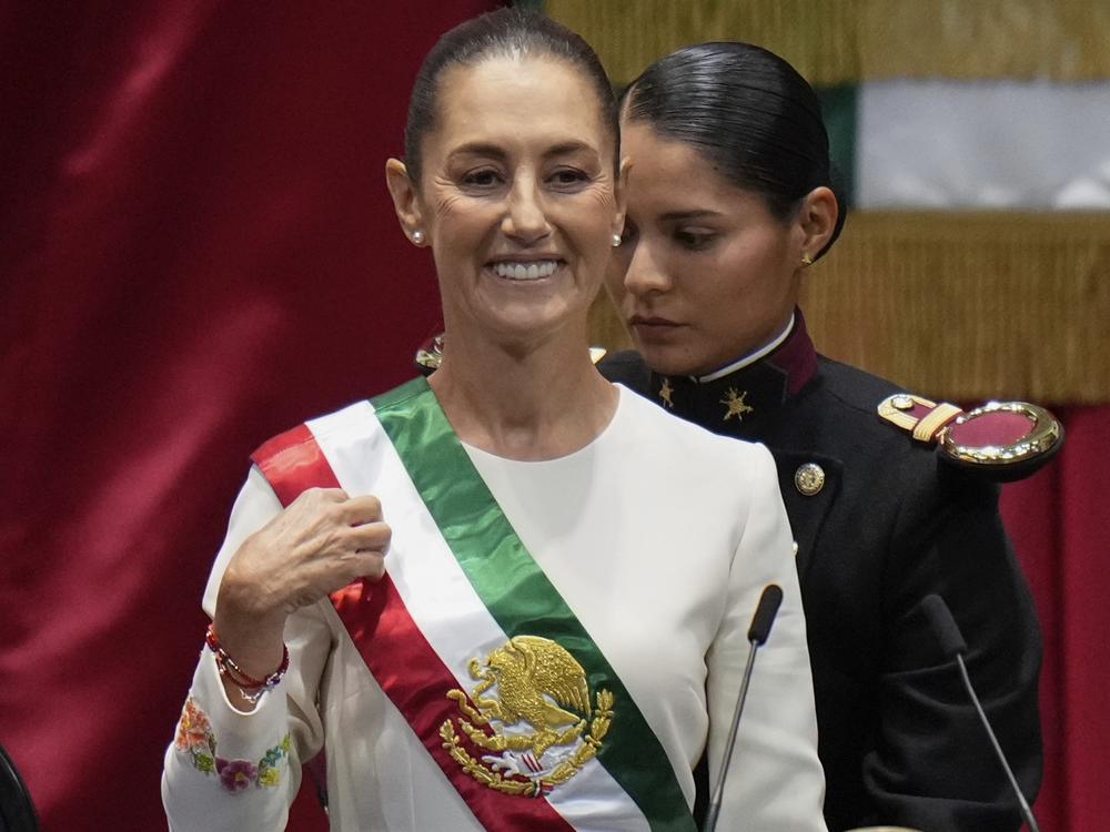 President Claudia Sheinbaum wears the presidential sash during her swearing-in ceremony as Mexico's new president in Mexico City, October 1 2024