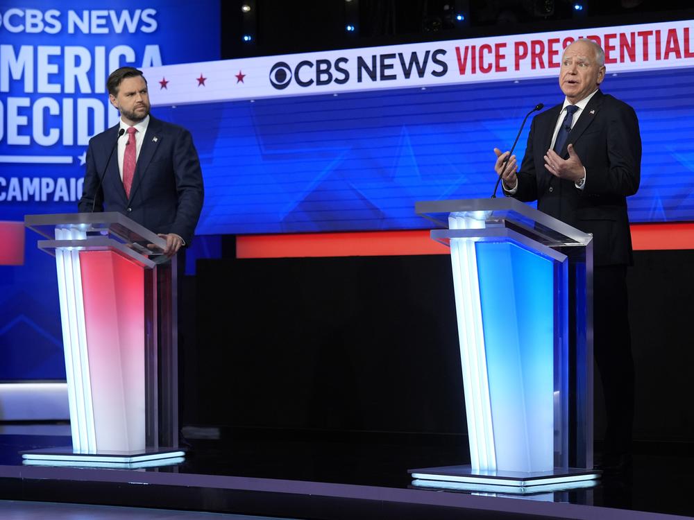 Republican vice presidential nominee Sen. JD Vance of Ohio and Democratic vice presidential nominee Minnesota Gov. Tim Walz participate in a debate hosted by CBS News on Tuesday in New York.