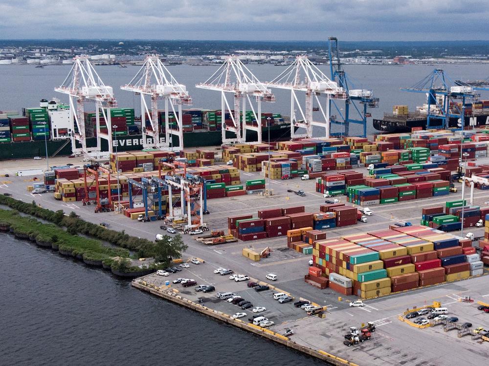 Shipping containers sit piled at the Port of Baltimore on September 21, 2018. Dockworkers on the East Coast and Gulf Coast have threatened to strike as early as October 1, if a new contract deal is not reached.