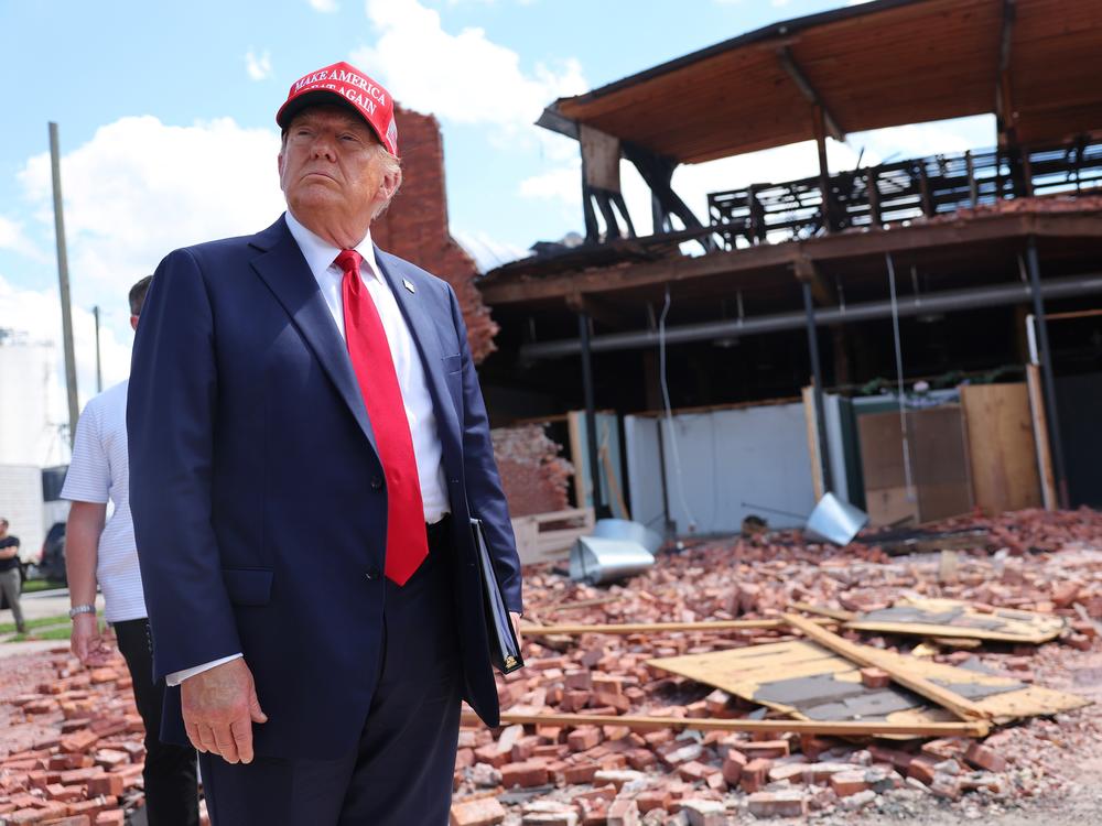 Former President Donald Trump visitsa furniture store damaged during Hurricane Helene in Valdosta, Ga., on Sept. 30.
