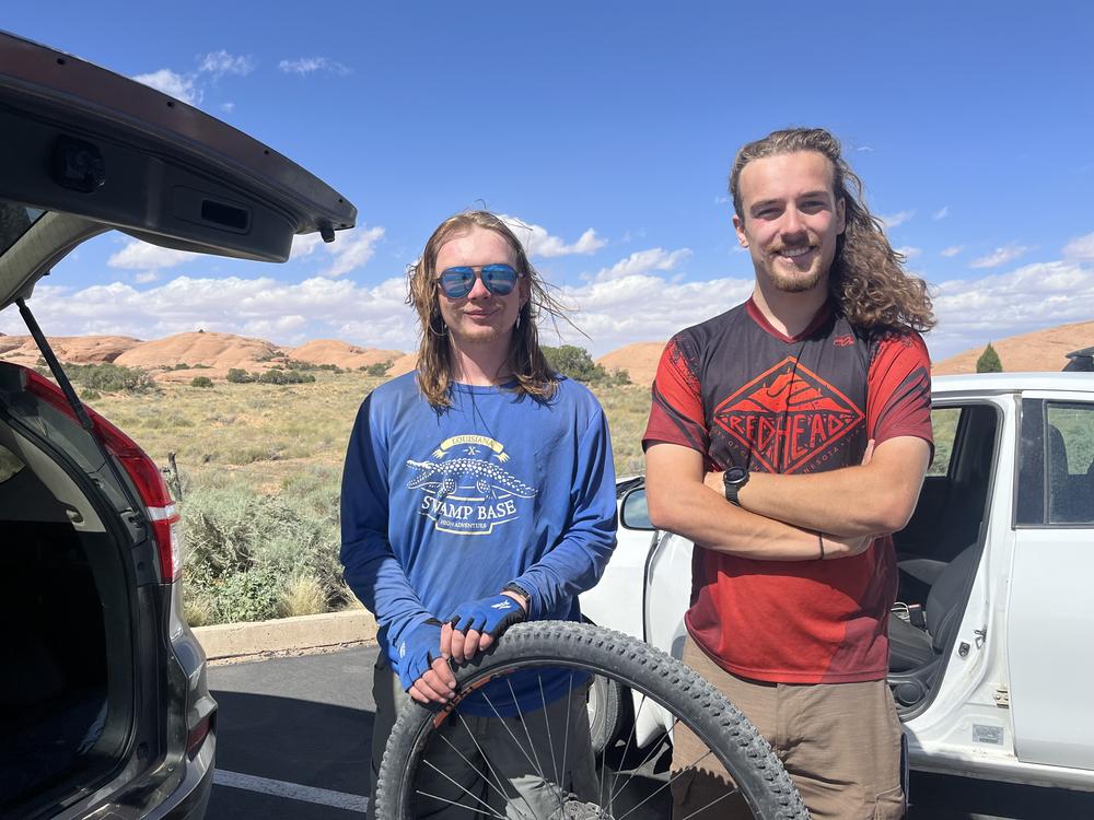 Will Burger (left) and Isaac Hamlen (right) after finishing a mountain bike ride on Moab's famous Slick Rock Trail.