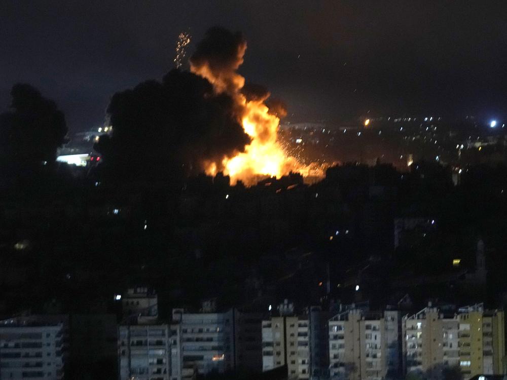 Flames rise from Israeli airstrikes in Dahiyeh, Beirut, Lebanon, Friday.