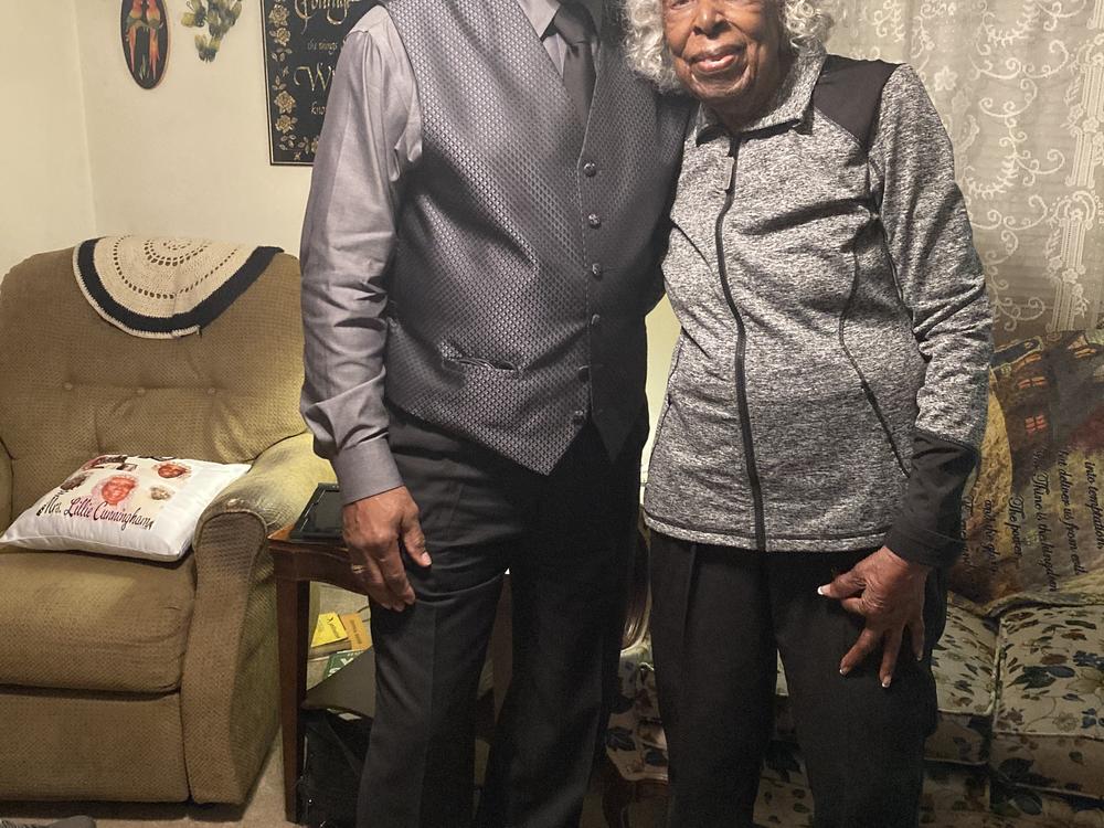 Lillie Cunningham and her great-nephew Rickie Cole at her home on Sunday. 