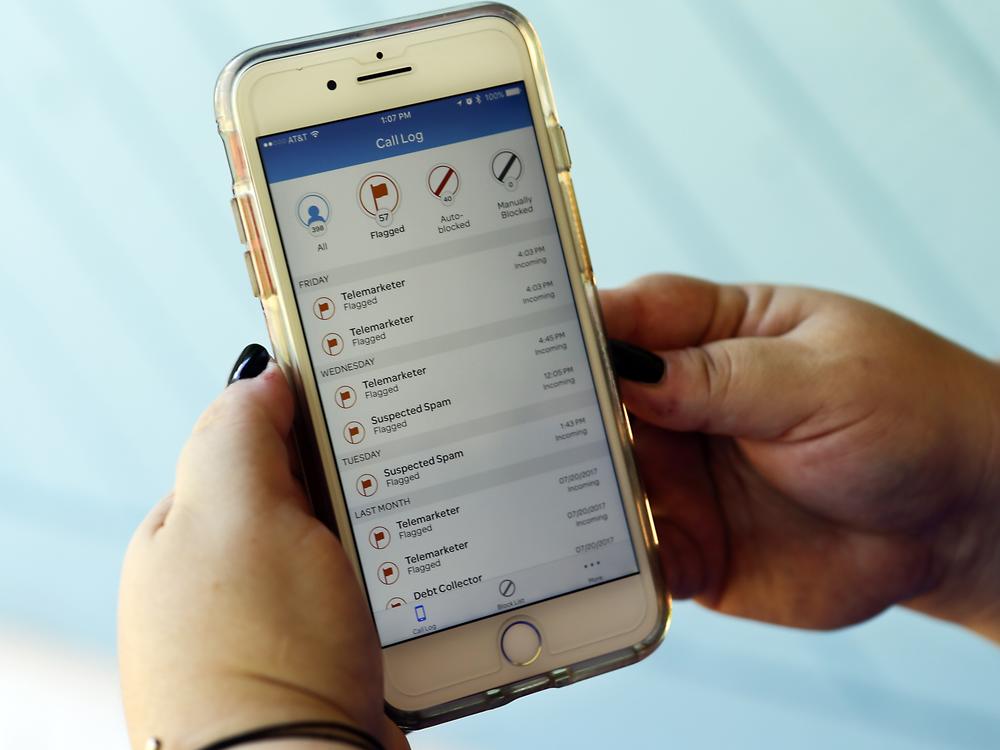 This Aug. 1, 2017, file photo, shows a call log displayed via an AT&T app on a cellphone in Orlando, Fla.