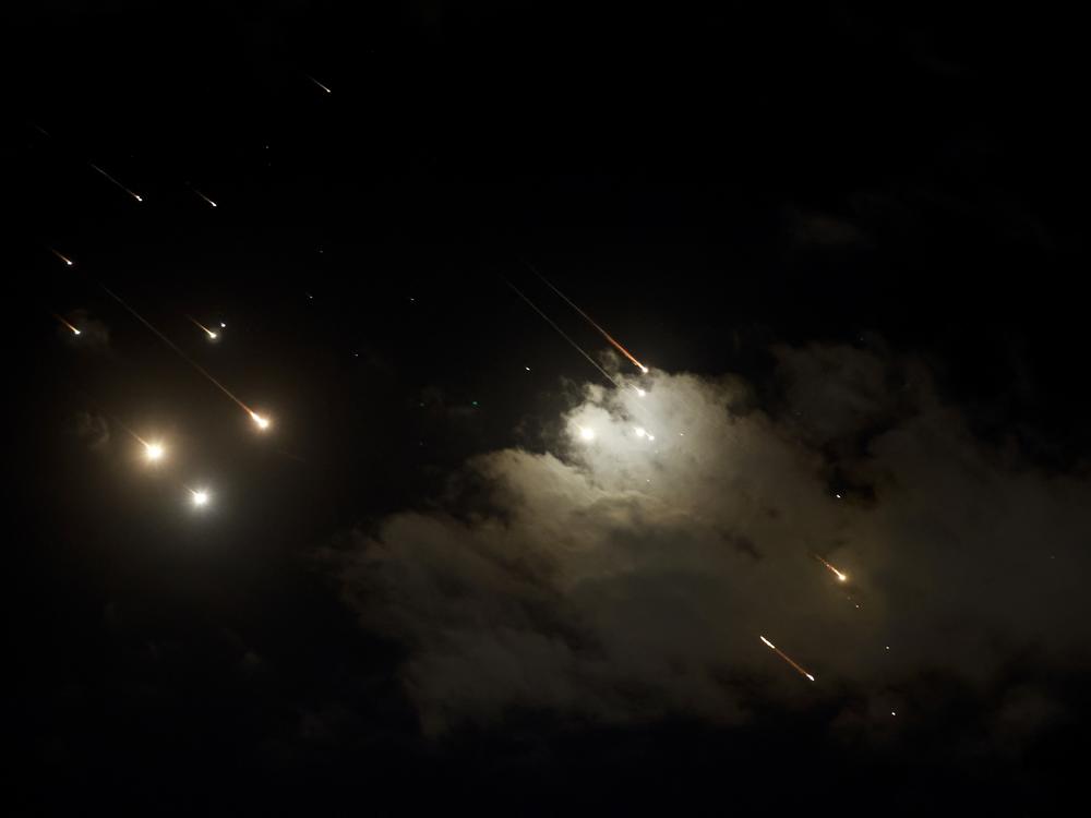 Projectiles above Jerusalem, on Tuesday. Israel says Iran launched more than 180 missiles but that the assault did little damage.