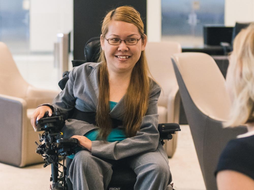 Tabi Haly defied expectations. She's a woman with spinal muscular atrophy — also, a software engineer and a vice president at JPMorgan Chase.