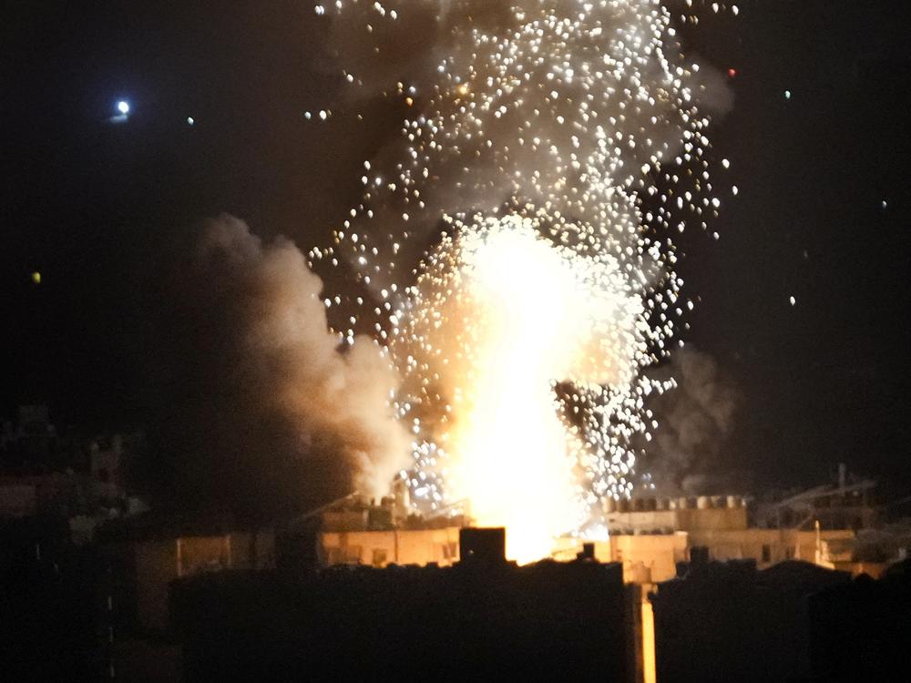 Flames and smoke rise from an Israeli airstrike in Dahiyeh, Beirut, Lebanon, early Sunday, Oct. 6, 2024.
