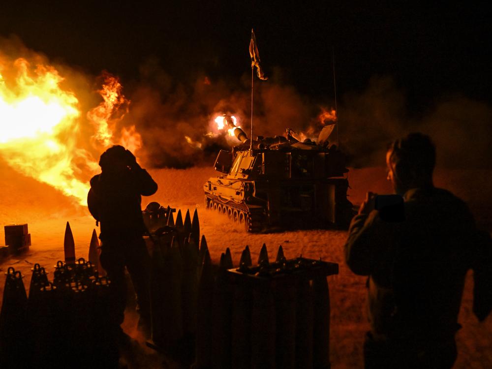 An Israeli artillery unit, using a self-propelled artillery howitzer, fires toward Gaza near the border with it in southern Israel on Dec. 11, 2023.