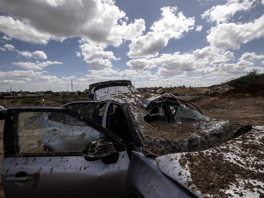 A view of a vehicle damaged in Tel Aviv by Iran's attack. Relatively few missiles got through to Israel's largest city, suggesting that the military may have chosen to defend it over its air bases.