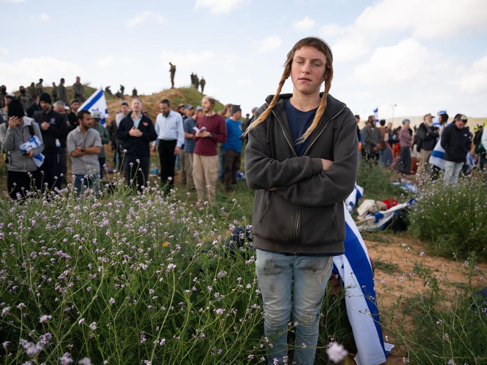 Israeli protesters attempt to block the road as aid trucks cross into the Gaza Strip, as Israeli border police watch over them, at the Kerem Shalom border crossing, southern Israel, Jan. 29.