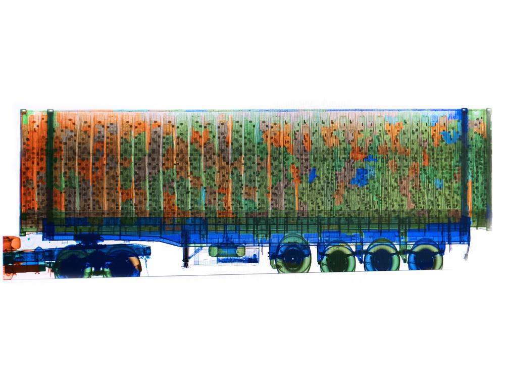 An X-ray image of a cargo truck going through customs in Accra, Ghana. A drive-through X-ray portal at the port can scan up to 120 vehicles an hour for illicit items, but the investigative team found that well-placed bribes can get some officials to allow e-waste through.