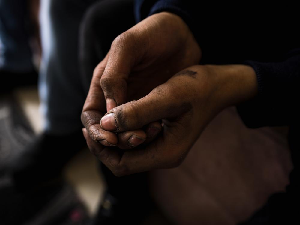 Noor may be young, but he has the hardened hands of a working man.