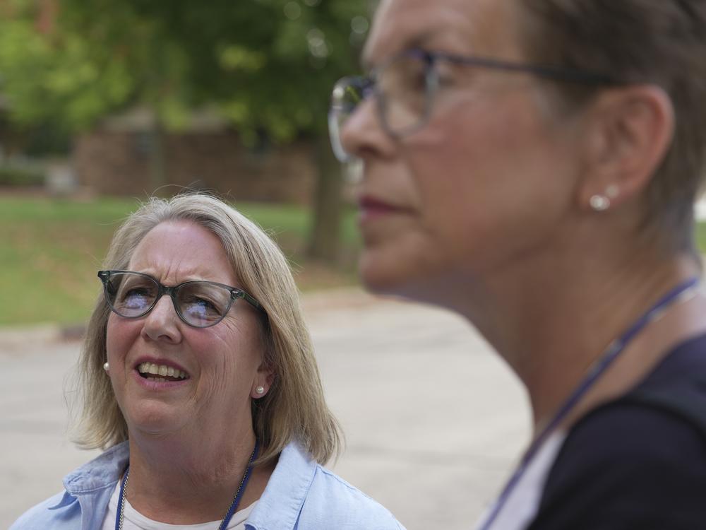 Margie Black (left) and Barb Biggler spend an afternoon door knocking in Walworth County to campaign for Vice President Harris.