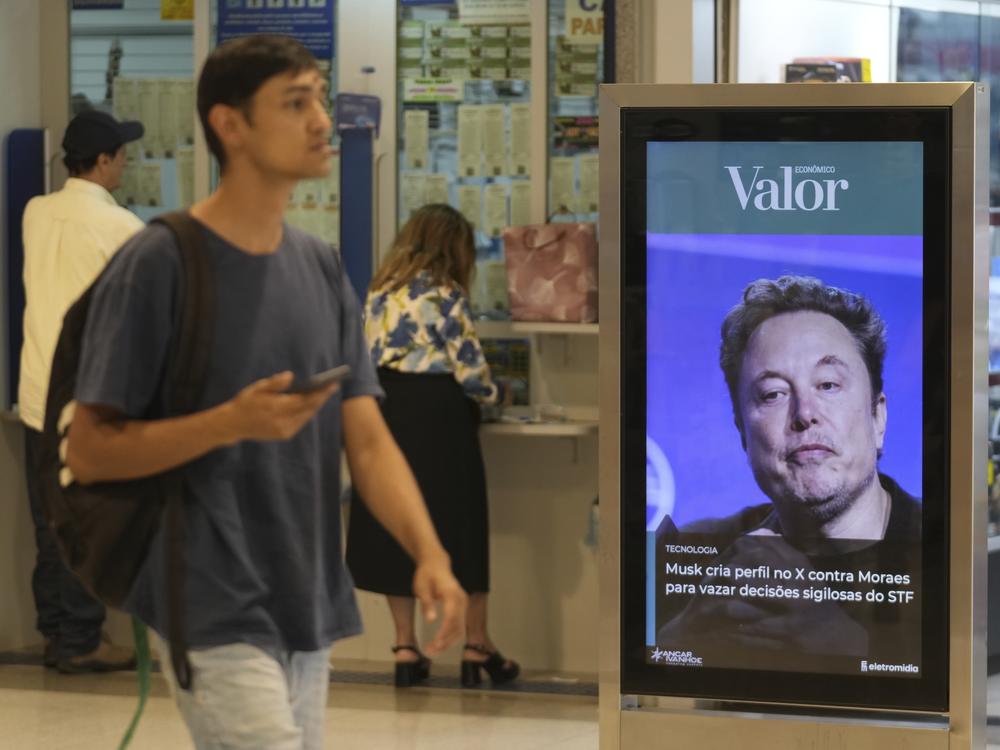 An ad by Valor media shows a photo of Elon Musk at a shopping center in Brasilia, Brazil, on Sept. 2.