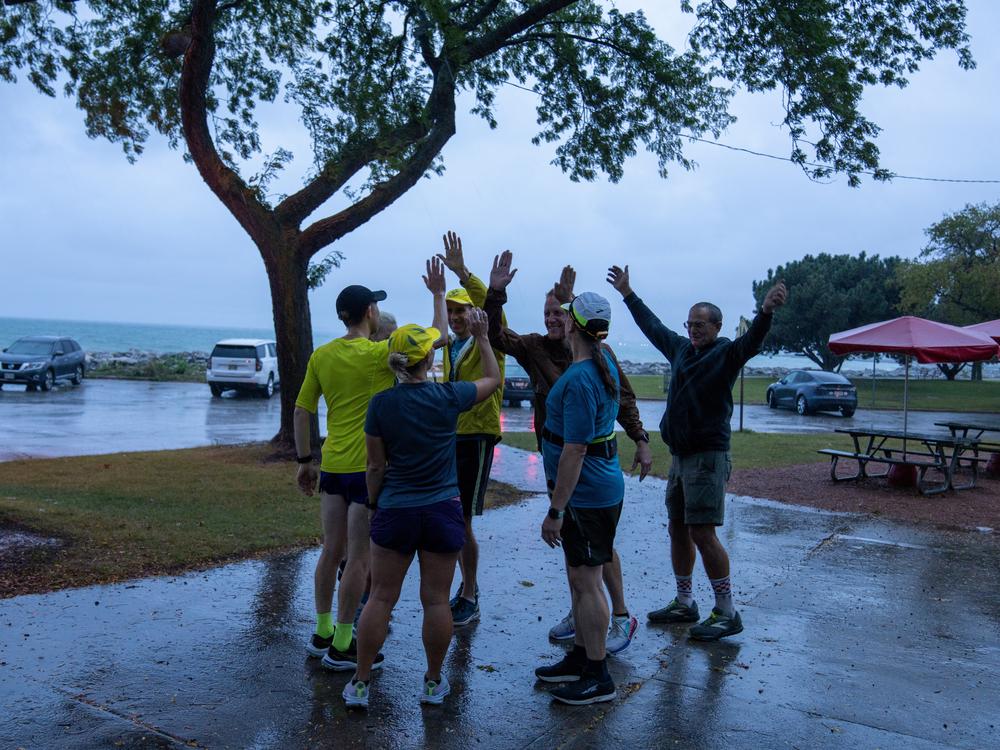 The Milwaukee Running Group — OMG meets up on a rainy morning in Milwaukee recently.