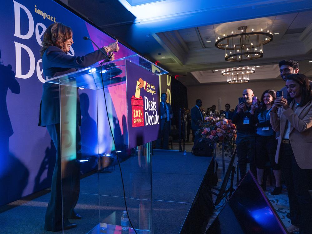 Vice President Kamala Harris makes the thumbs up sign as she arrives in a surprise appearance to speak to the Indian American Impact Project's Annual Summit, Wednesday, May 15, 2024, in Washington.