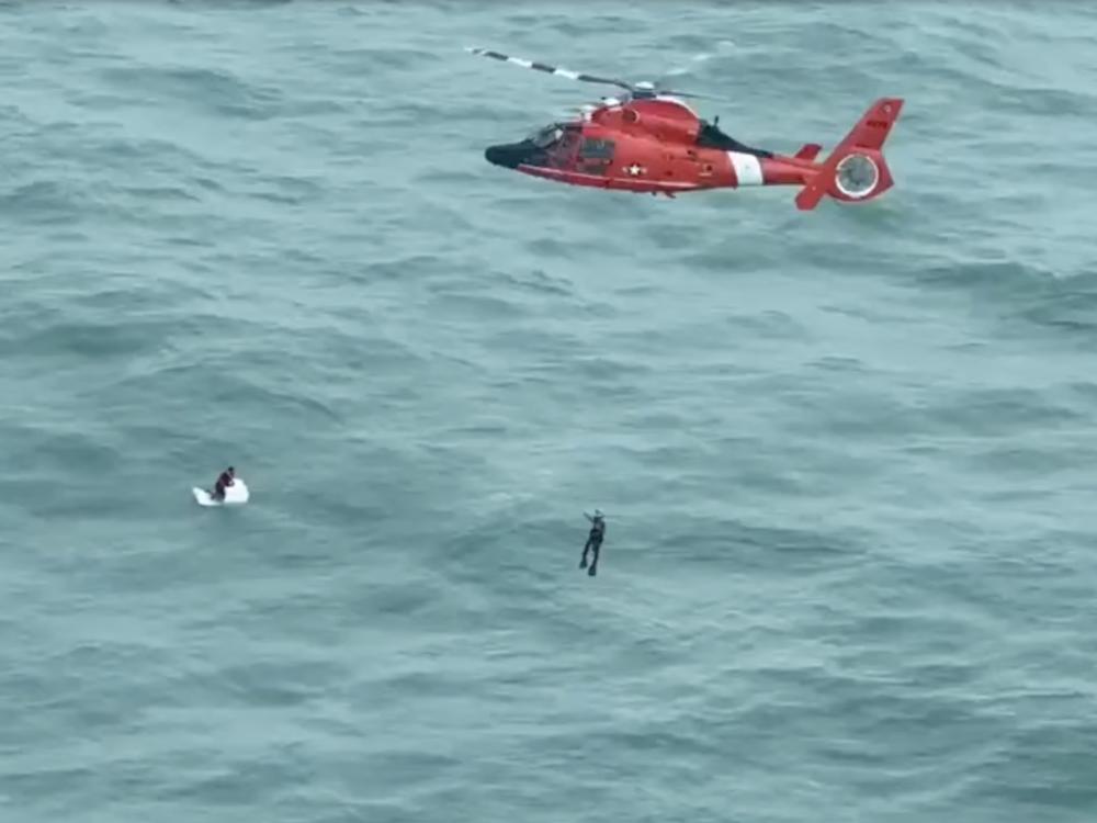 A man survived a harrowing ordeal in open water as Hurricane Milton passed nearby, spending the night clinging to a large cooler before being rescued by a Coast Guard helicopter crew some 30 miles from shore.