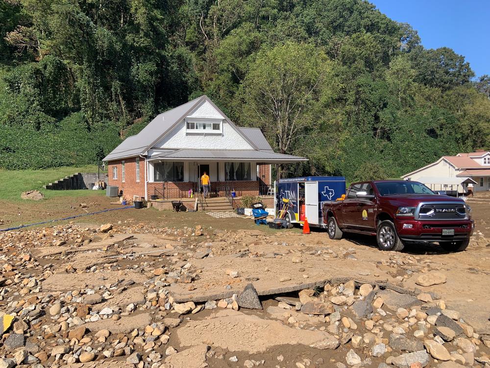 Volunteers from Texans On Mission clean out a home that was flooded by the Nolichucky River, near Jonesborough, Tenn.