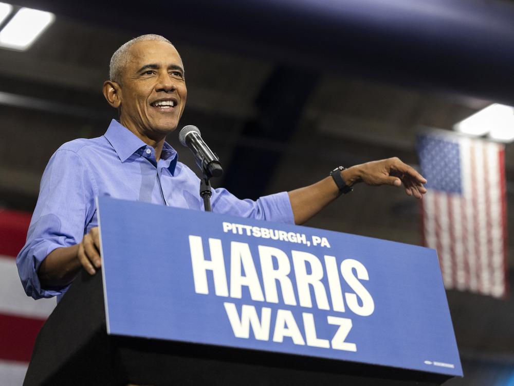 Former President Barack Obama speaks during a campaign event for Vice President Harris in Pittsburgh on Thursday. Prior to the rally, Obama made a special plea to Black men who have been hesitant to support Harris.