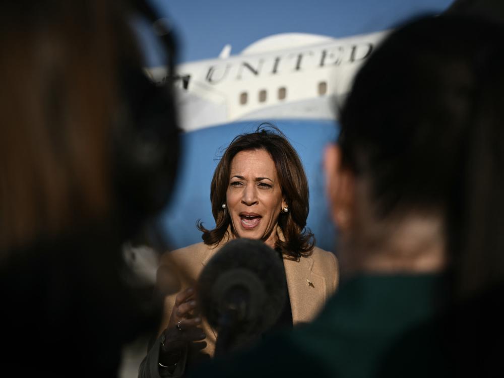 Vice President Harris takes questions from reporters at Joint Base Andrews in Maryland on Oct.12, 2024.