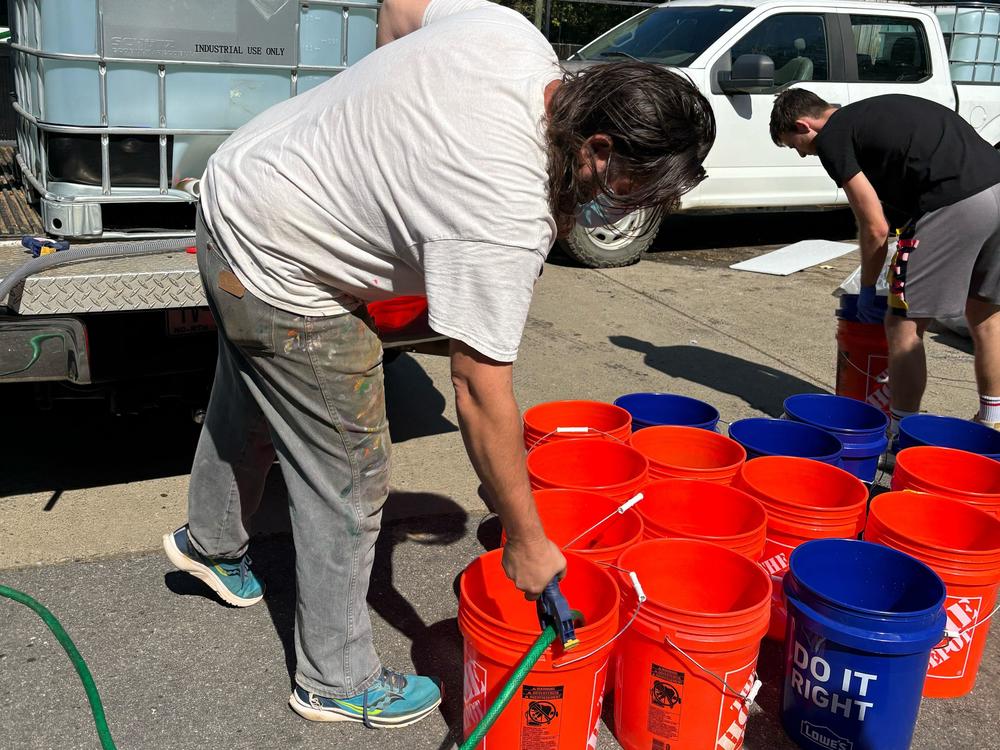 Jerry Cahill has been flushing toilets as a volunteer since his studio in Asheville's River Arts District was destroyed by flooding from the remnants of Helene.