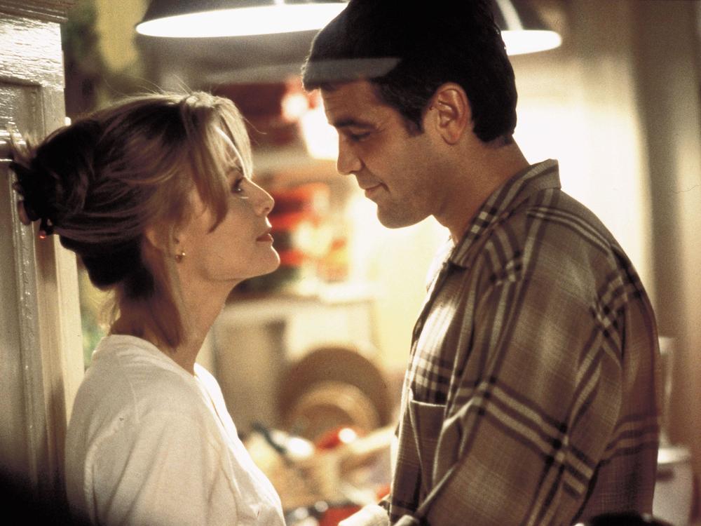 Michelle Pfeiffer and George Clooney play single parents trying to get through a very busy day in New York in <em>One Fine Day.</em>