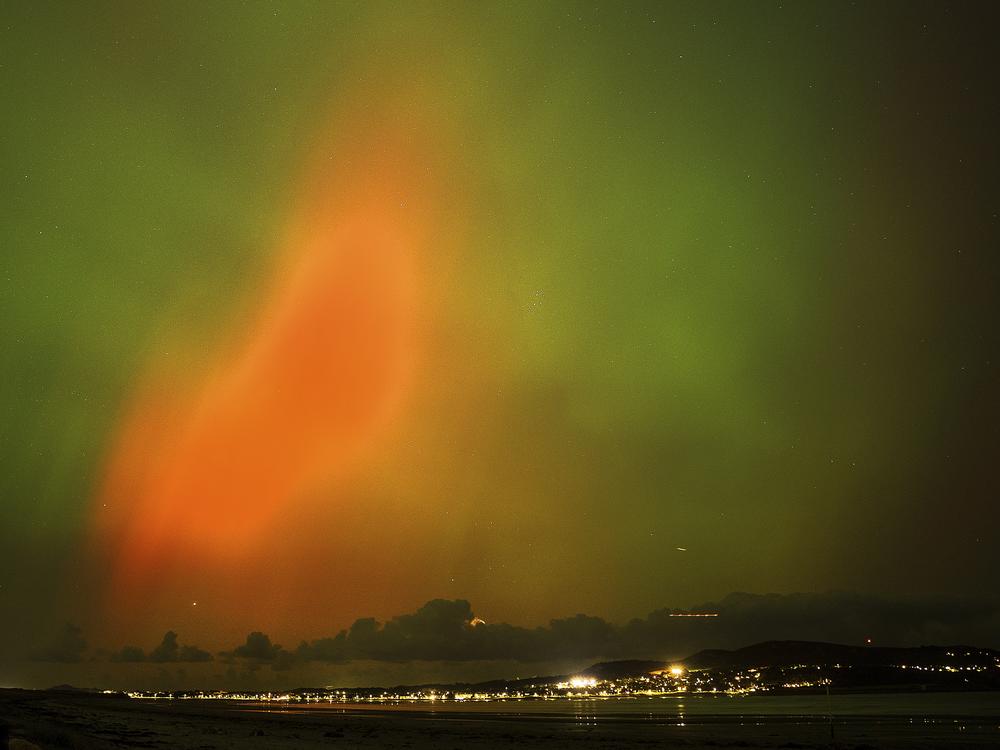 The northern lights, also known as the aurora borealis, are seen on display in the skies over Dublin on Oct. 10.