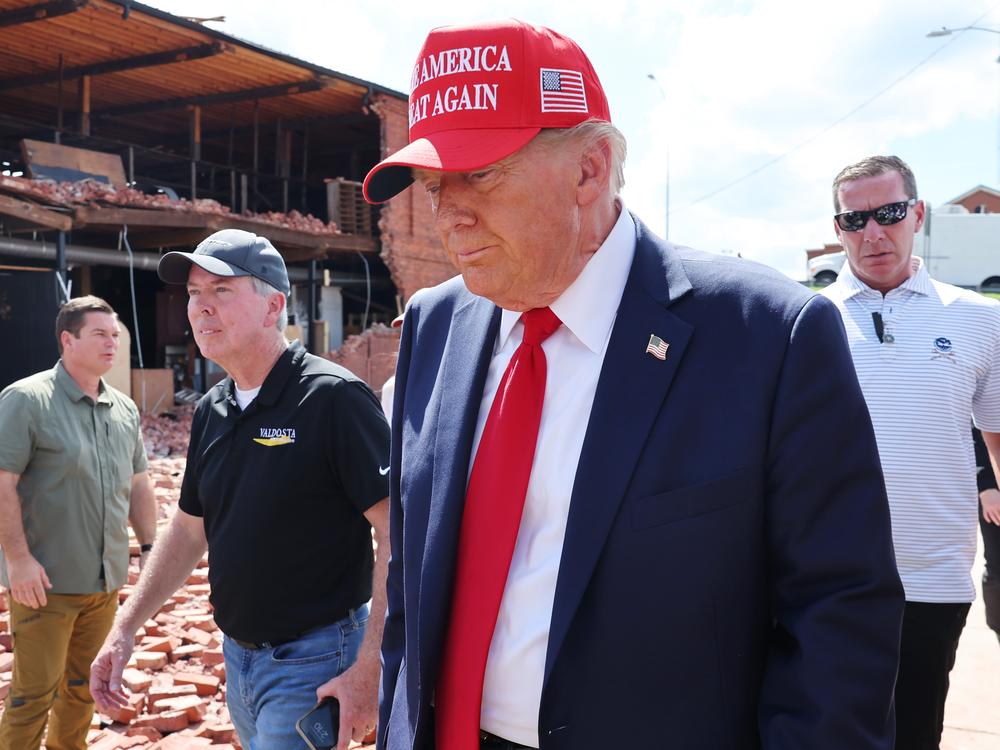 Former President Donald Trump prepares to leave after visiting Chez What Furniture store that was damaged during Hurricane Helene on Sept. 30, 2024 in Valdosta, Ga. Trump met with local officials, first responders, and residents who were impacted by the storm.