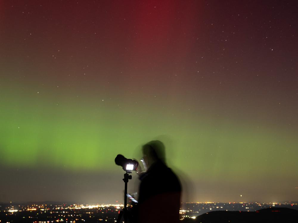 The northern lights, produced by a solar geomagnetic storm, are seen from Shenandoah National Park in Rileyville, Virginia, on Oct. 10.