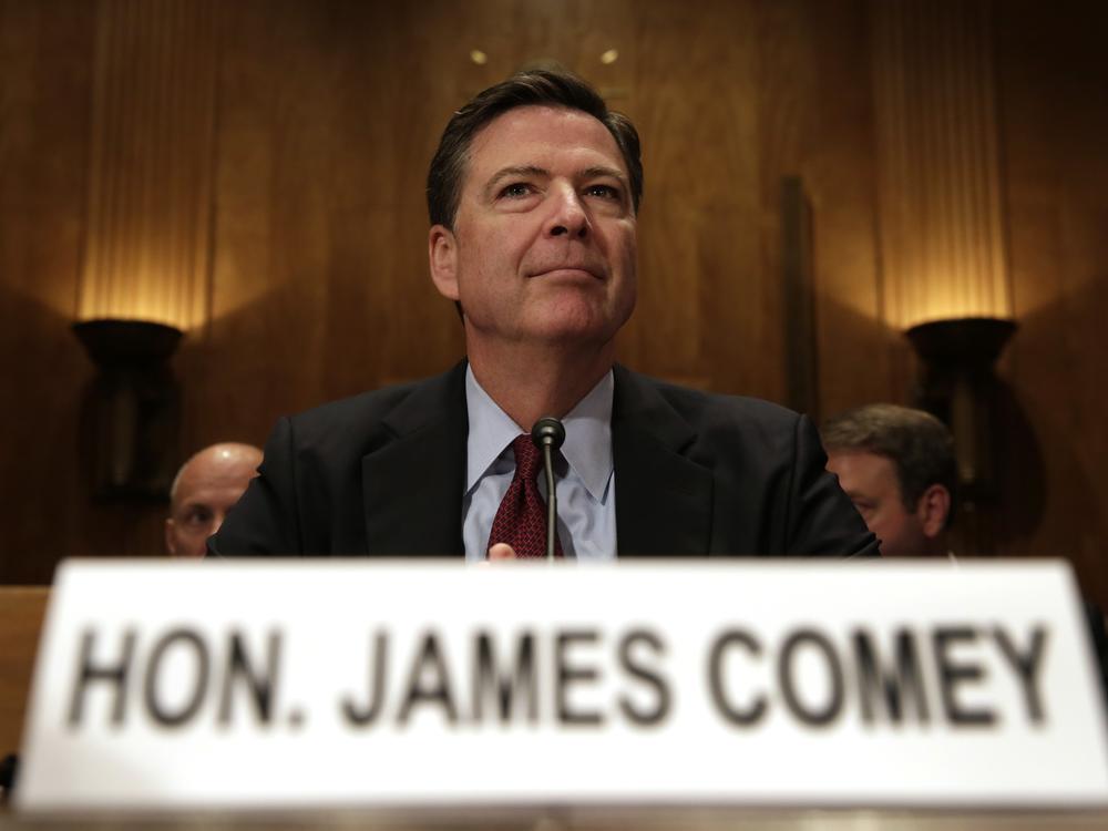 Former FBI Director James Comey shook the presidential race in October 2016 when he announced the discovery of a new batch of Hillary Clinton emails. Above, Comey testifies before Congress on Sept. 27, 2016.