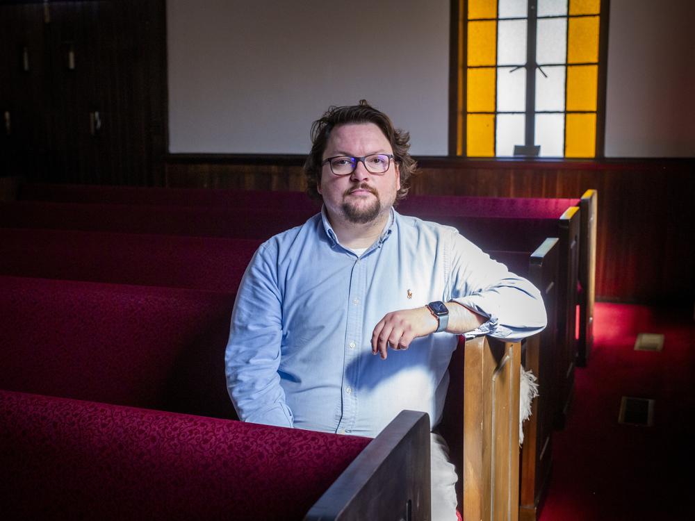 Local attorney Tyler Ward sits inside the Graham Memorial Presbyterian Church in Whitesburg, Ky. The church held a Healing Together event on Sept. 27, 28 and 30, following the courthouse shooting on Sept. 19. Ward says the judge's killing has shaken the community.