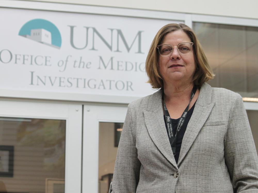 Forensic anthropologist Heather Edgar with the Office of the Medical Investigator poses for a portrait outside her office in Albuquerque, New Mexico.
