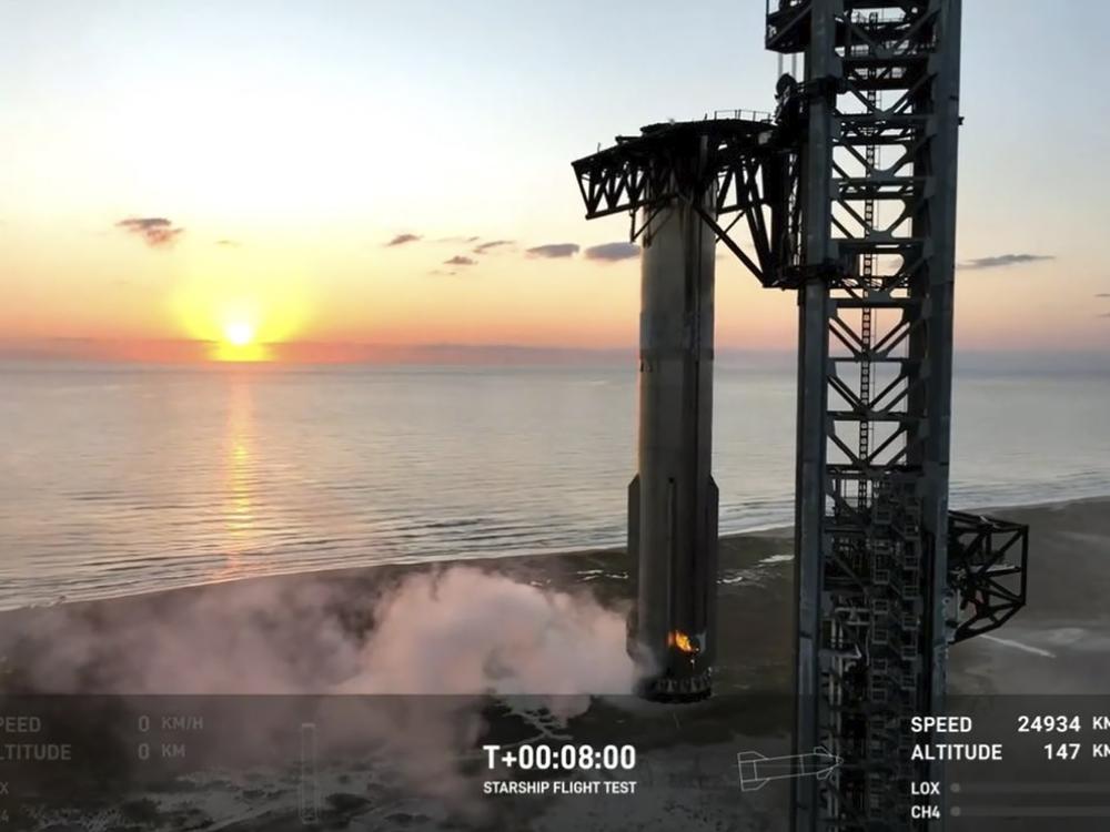 This image provided by SpaceX shows SpaceX's mega Starship rocket upon its return during a test flight on Sunday, over Boca Chica, Texas.
