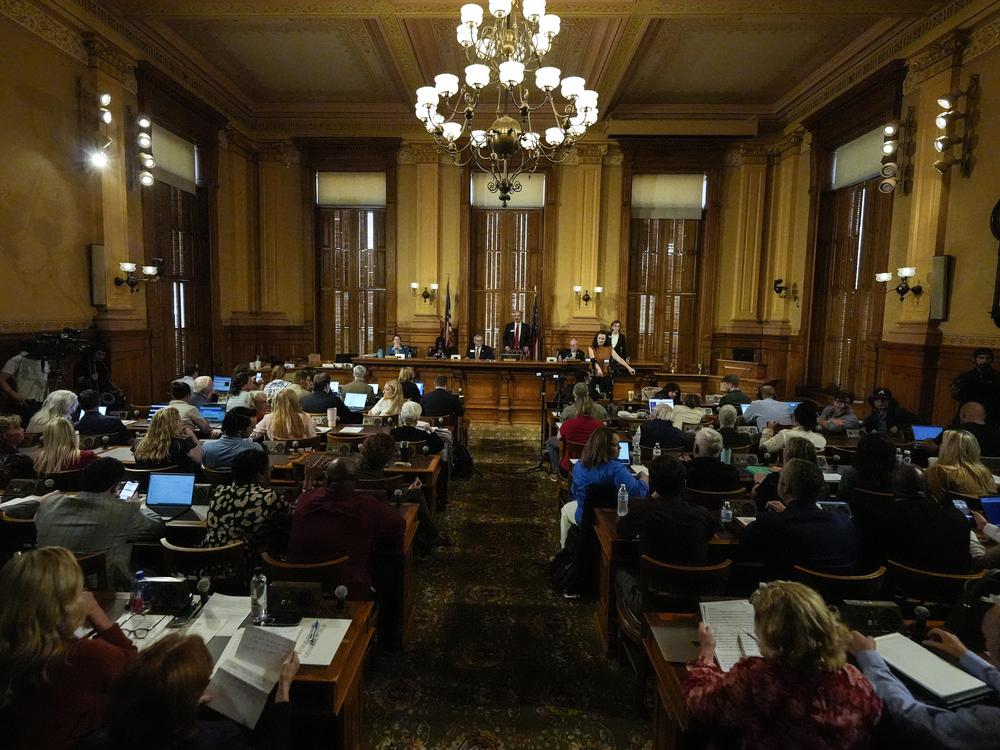 Georgia's State Election Board members discuss proposals for election rule changes on Sept. 20 in Atlanta.