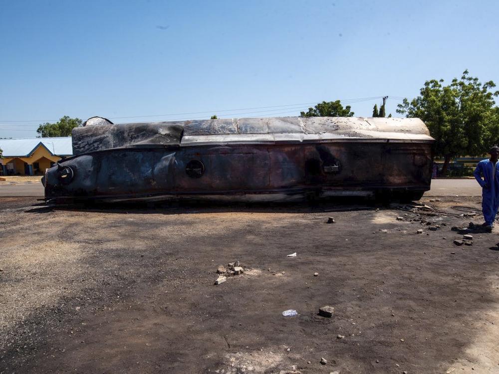 People gather at the scene of a tanker explosion in Majiya town, Nigeria, on Wednesday.