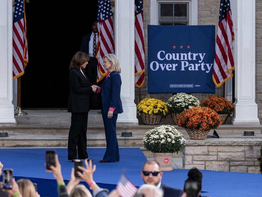 Former Rep. Liz Cheney, greets Democratic presidential nominee, Vice President Kamala Harris during a rally at Ripon College on Oct. 3, 2024 in Ripon, Wisc.
