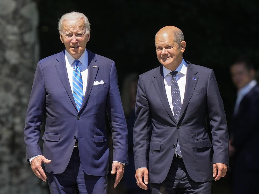 President Biden and German Chancellor Olaf Scholz (right) arrive for the official Group of Seven summit welcome ceremony at Castle Elmau in Krün, Germany, on June 26, 2022.