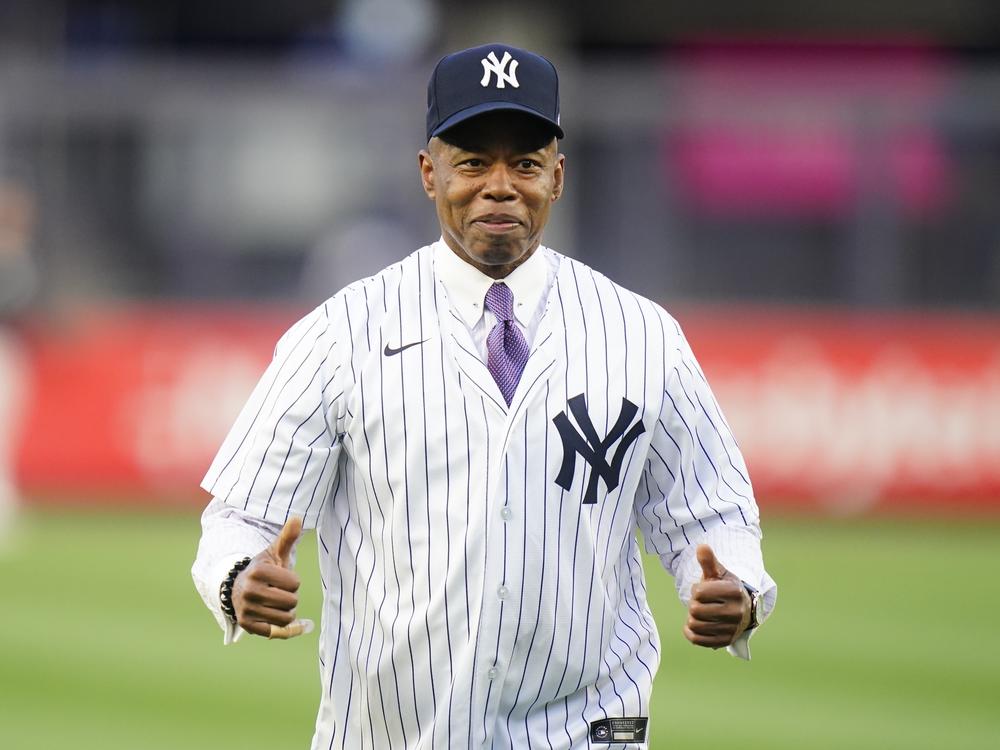 New York City Mayor Eric Adams gestures after throwing out a ceremonial first pitch before a baseball game between the New York Yankees and the Toronto Blue Jays Tuesday, May 10, 2022, in New York.